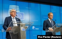 Jean-Claude Juncker ve Donald Tusk