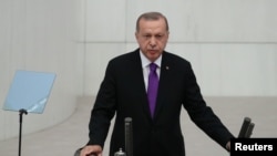 Turkey's President Erdogan addresses members of parliament