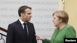 Fransa Cumhurbaşkanı Emmanuel Macron ve Almanya Başbakanı Angela Merkel